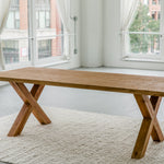 solid teak wood rectangular dining table with cross legs made from sustainable materials