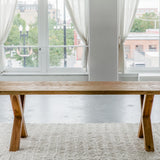 solid teak wood rectangular dining table with cross legs made from sustainable materials
