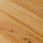 close up of natural wood grain for round dining table