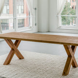 solid teak wood rectangular dining table with cross legs made from sustainable materials