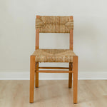 classic wooden chair in a honey stain with a woven seagrass back and seat